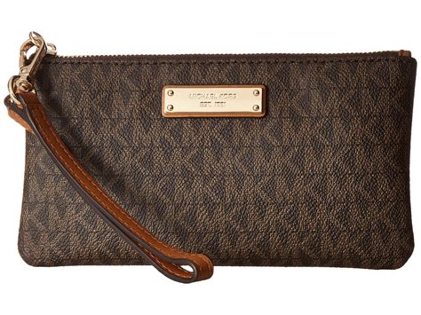 michael michael kors medium fold over clutch|Michael Kors wristlet outlet.